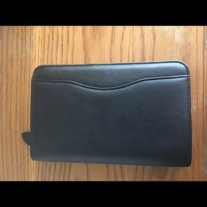 Black day time planner zip planner.