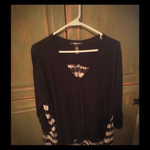 Cute Blouse. Great paired w/leggings or jeans.
