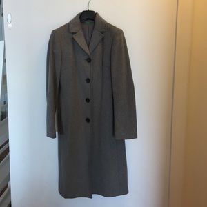 gently worn. Made in Italy. 80% wool. 20% nylon.