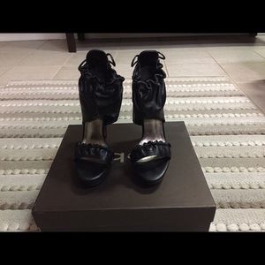 BeBe black leather pumps