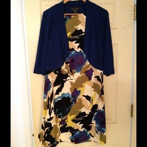 Sheath dress with sweater.