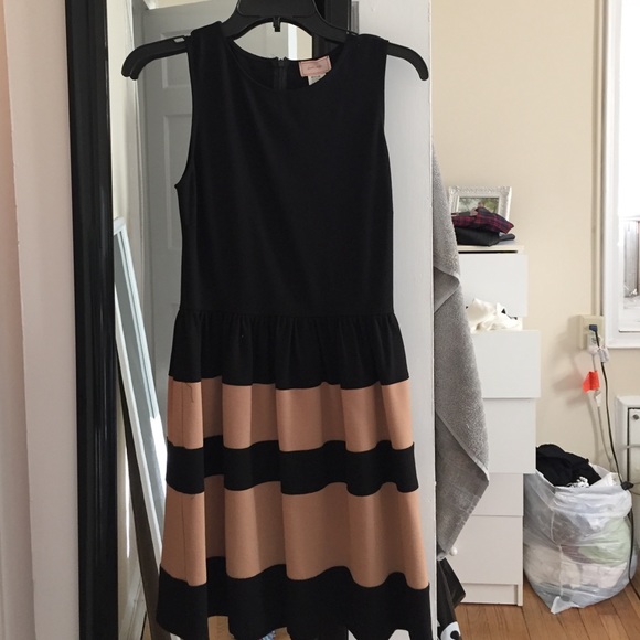 Adorable dress! Never worn with tags.