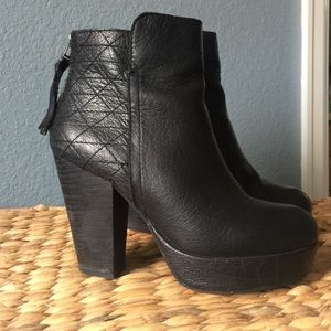 Black leather heeled booties