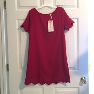 Medium red/burgundy scalloped dress. NWT