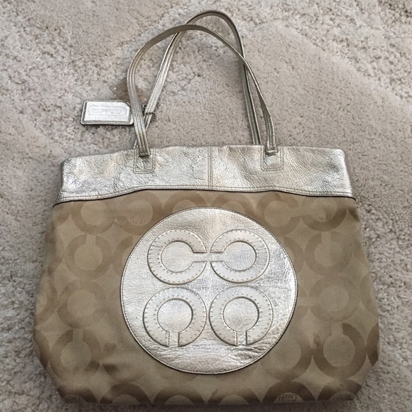 Coach Handbags - Preloved Metallic Coach Bag