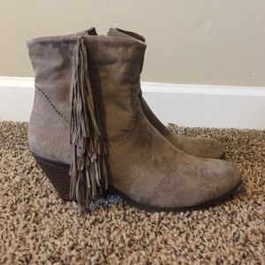 Taupe faux suede booties with fringe.