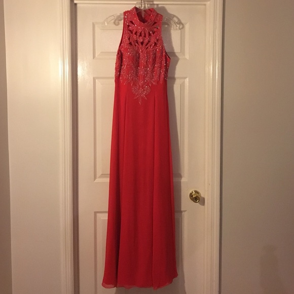 Beautiful red dress worn in a beauty pageant. - Picture 1 of 4