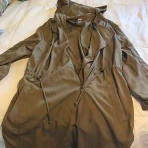 Dark tan thin spring jacket.