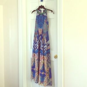 Maxi dress with embellished neckline.