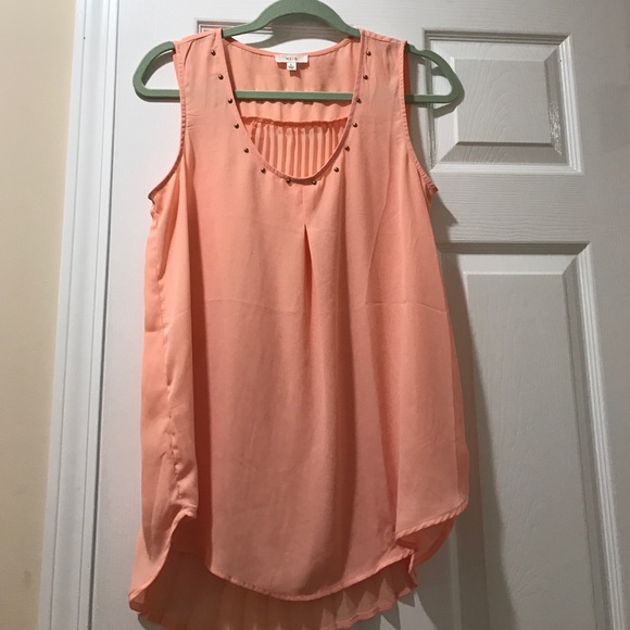 Sleeveless tank- pleat back detailing