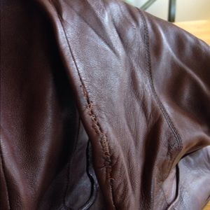 Super soft brown Frye slouch boots; some repair
