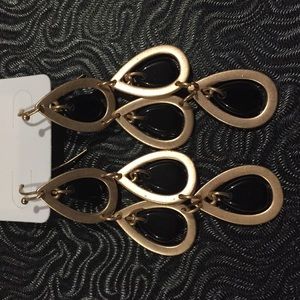 Dangling earrings.