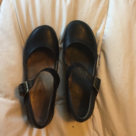 Sanita black clogs.