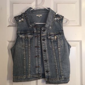 Medium wash jean jacket vest