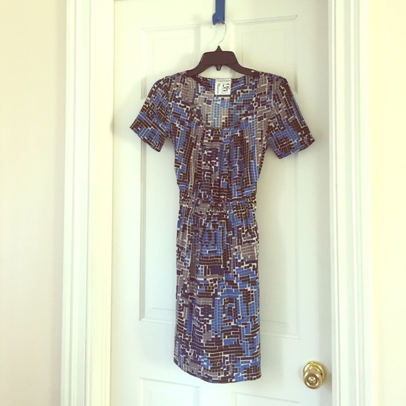 Mini dress with gathered waist.