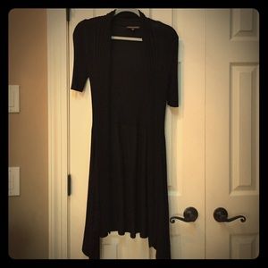 Sexy, slinky, black light shirt sleeve sweater