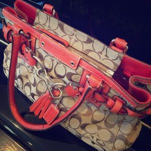 Orange/red coach monogram purse