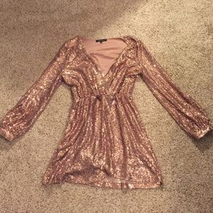 Small Honey Punch sequin dress.