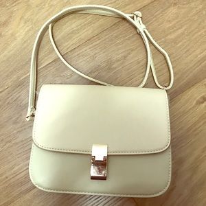 Urban expressions tan medium cross body purse