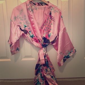 Pink oriental style silk robe.