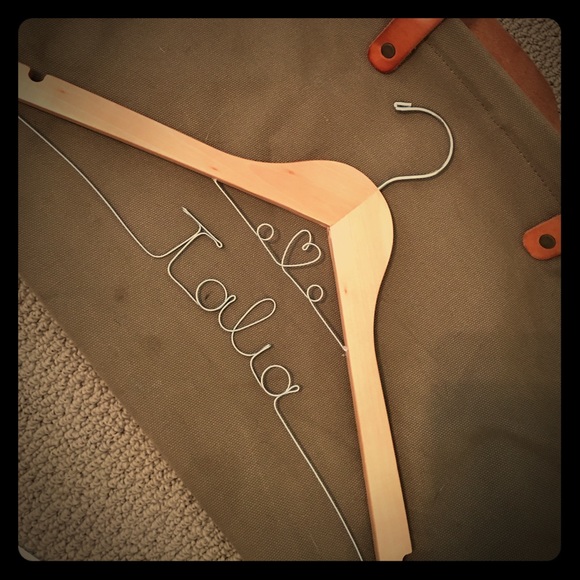 Light brown engraved name clothes hanger