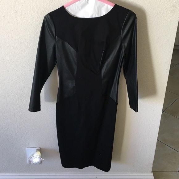 Black knee length dress with faux leather