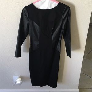 Black knee length dress with faux leather