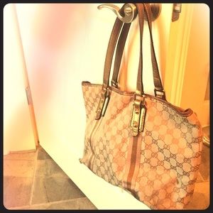 Gold and tan Gucci purse
