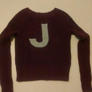 Red sweater from American Eagle Outfitters.