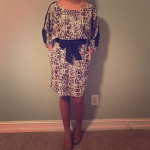 python patterned dress with black tie belt