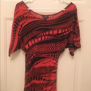 Bebe. Off shoulder shirt