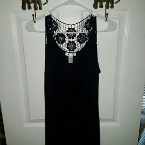 Black sleeveless top with crochet area on back