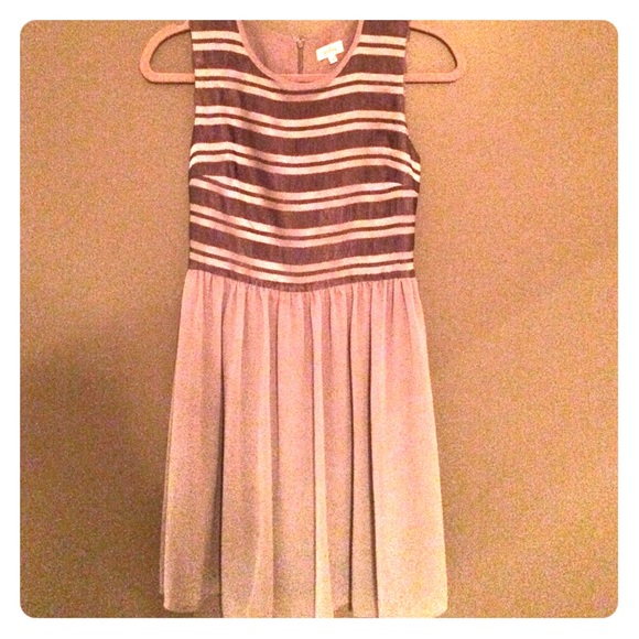 A-line gray flowy dress. 100% polyester.