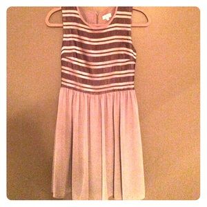 A-line gray flowy dress. 100% polyester.