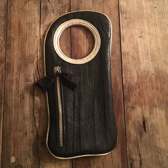 Arza bracelet clutch (black leather/gold trim)