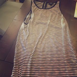 Long black and white razor cut tank