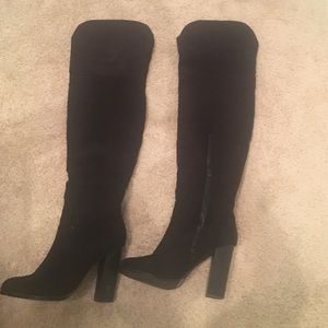 Thigh high black boots