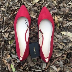Pointed faux suede flats