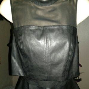 New BEBE top. Pleather with zipping back.