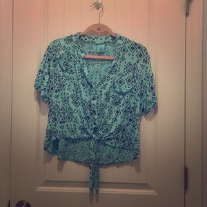 Nordstrom turquoise and black crop top.