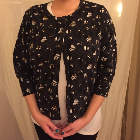 Black cardigan with circular patterns