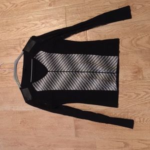 Sweater with  lace sleeves.