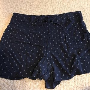 EUC navy linen shorts with bow accent