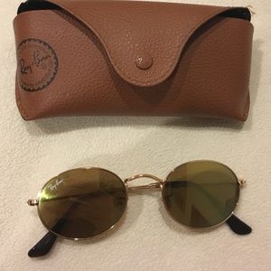 Gold mirrored raybans