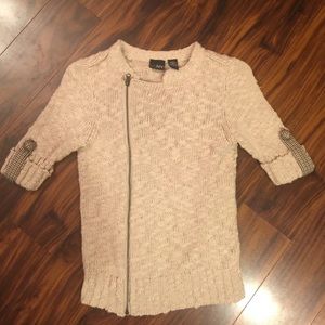 Day trip cream sweater with plaid accents.