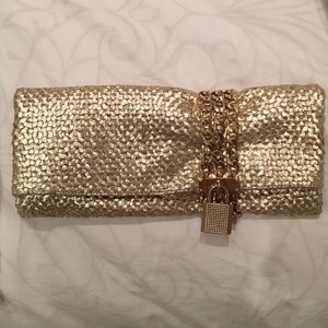 Goregous gold Jimmy Choo clutch
