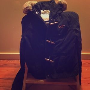 Hollister navy blue jacket; on hold!