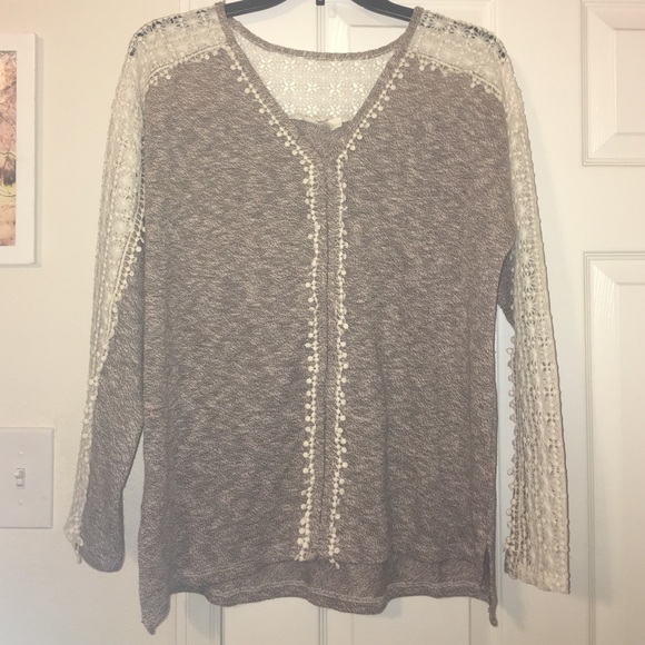 Boutique sweater with crochet detail