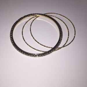 Beautiful gold and "diamond" bangles.