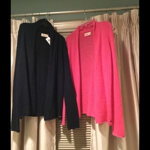 2 Hollister sweaters/never worn, one with tags